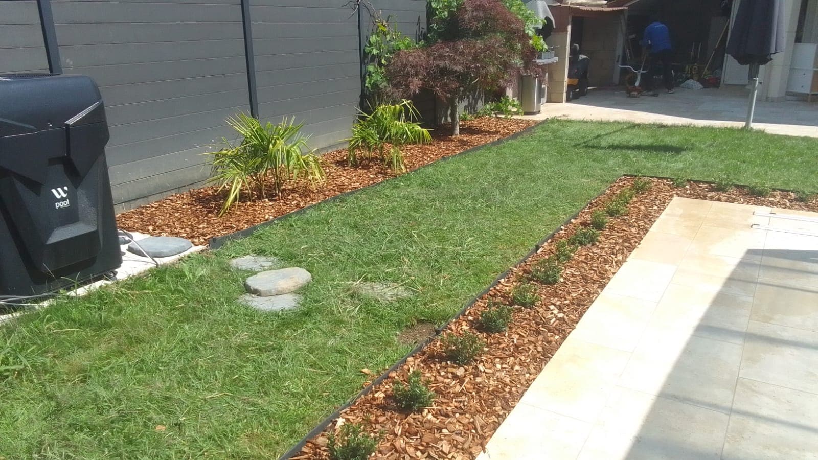 Aménagement jardin avec paillage et bordures